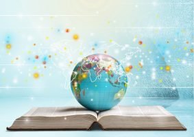 School stationery composition. globe on table and book
